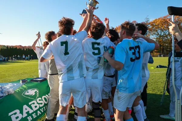 The Babson College mens soccer team celebrated its conference championship during the postgame ceremony